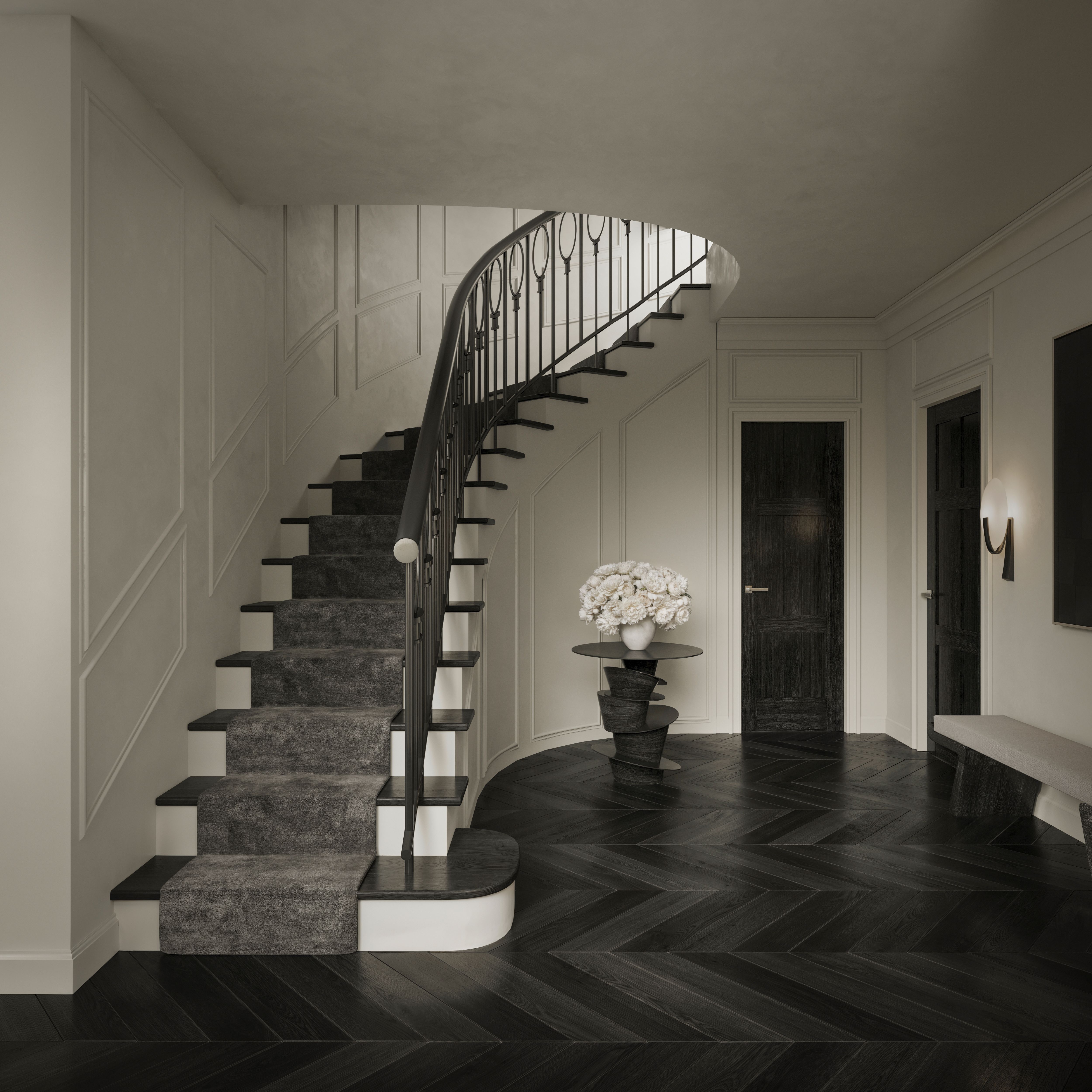 Sweeping curved staircase with bespoke ironwork in a Jack Freeman-designed Vaucluse hall