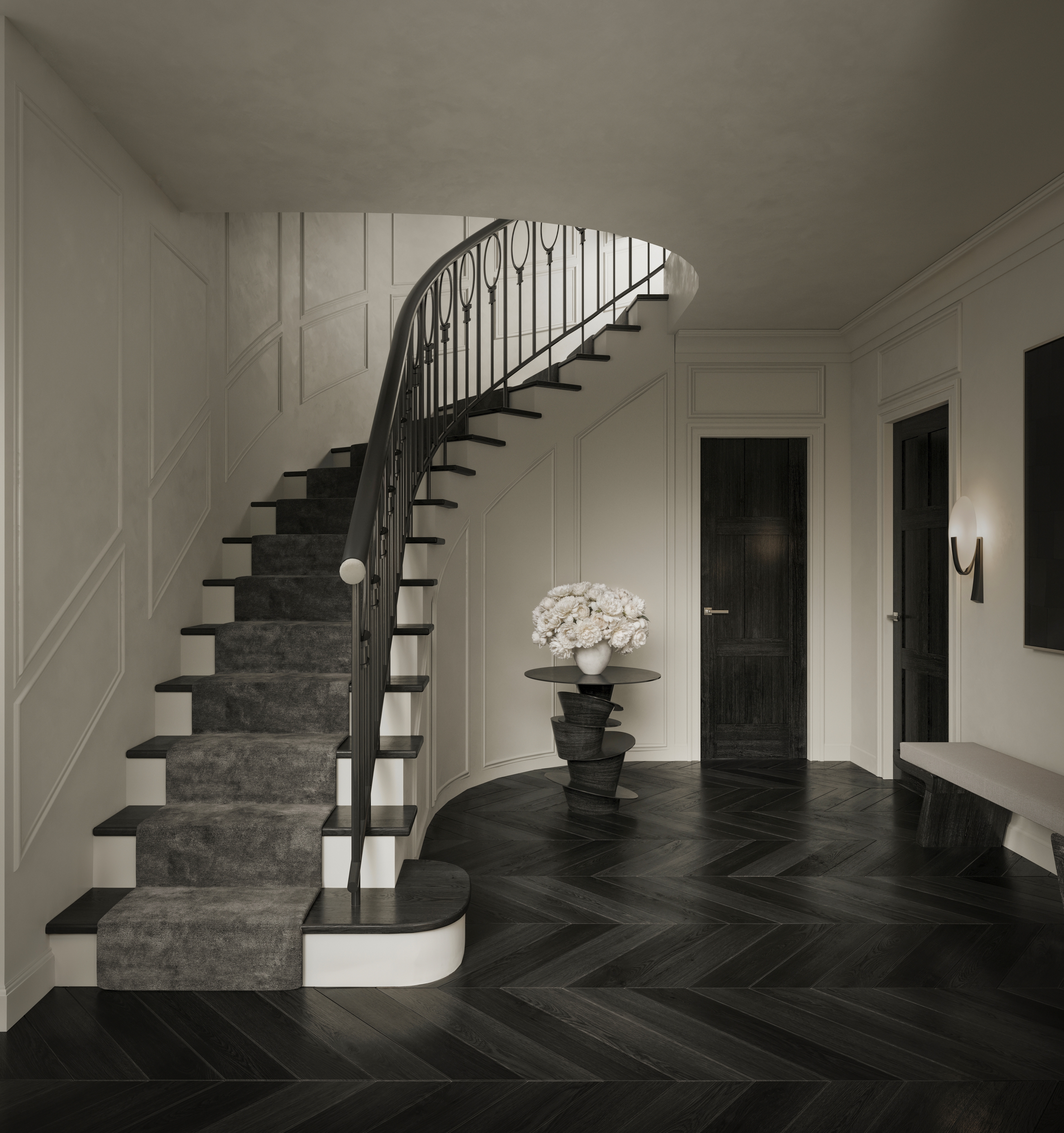 Sweeping curved staircase with bespoke ironwork in a Jack Freeman-designed Vaucluse hall