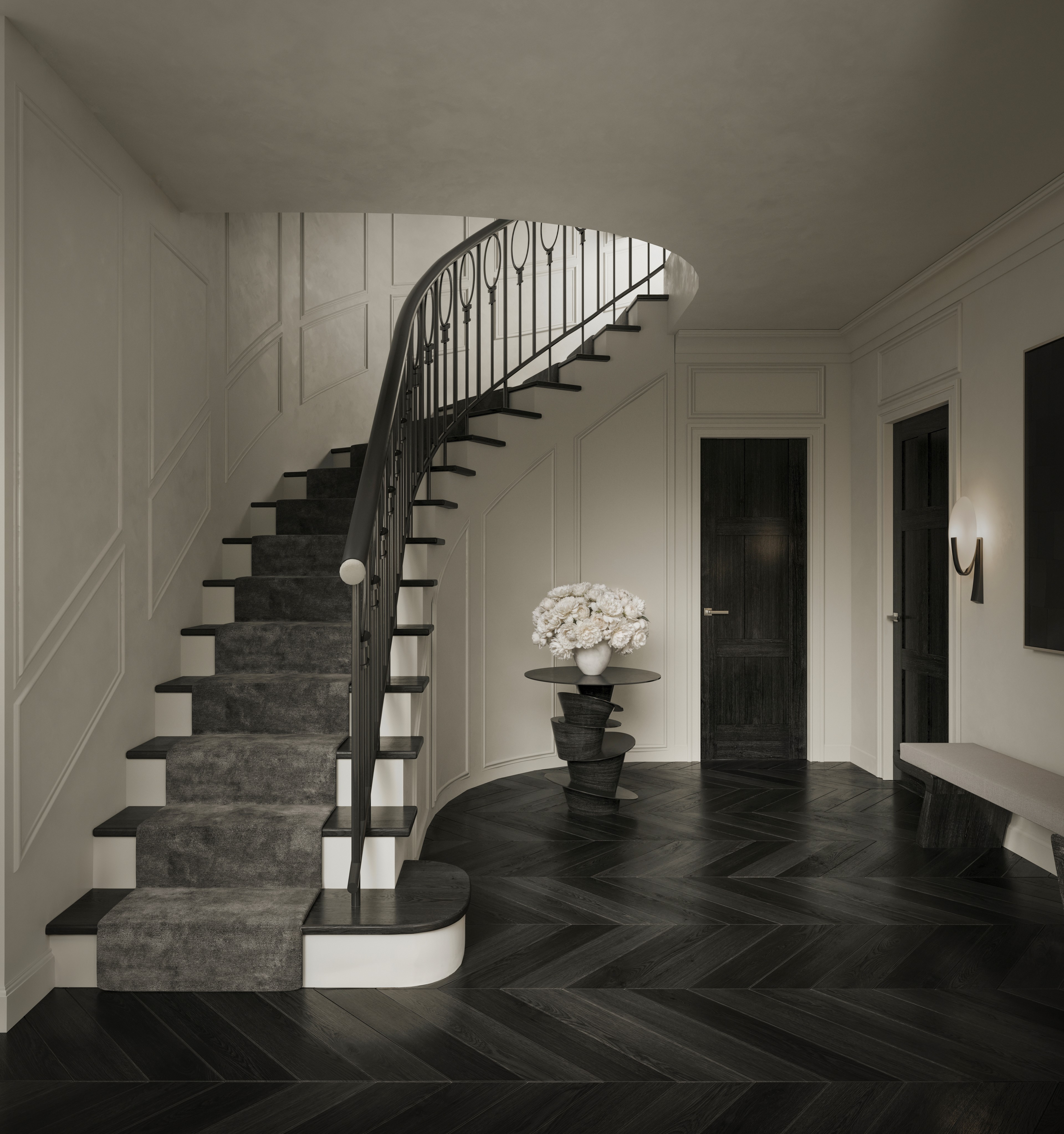 Sweeping curved staircase with bespoke ironwork in a Jack Freeman-designed Vaucluse hall