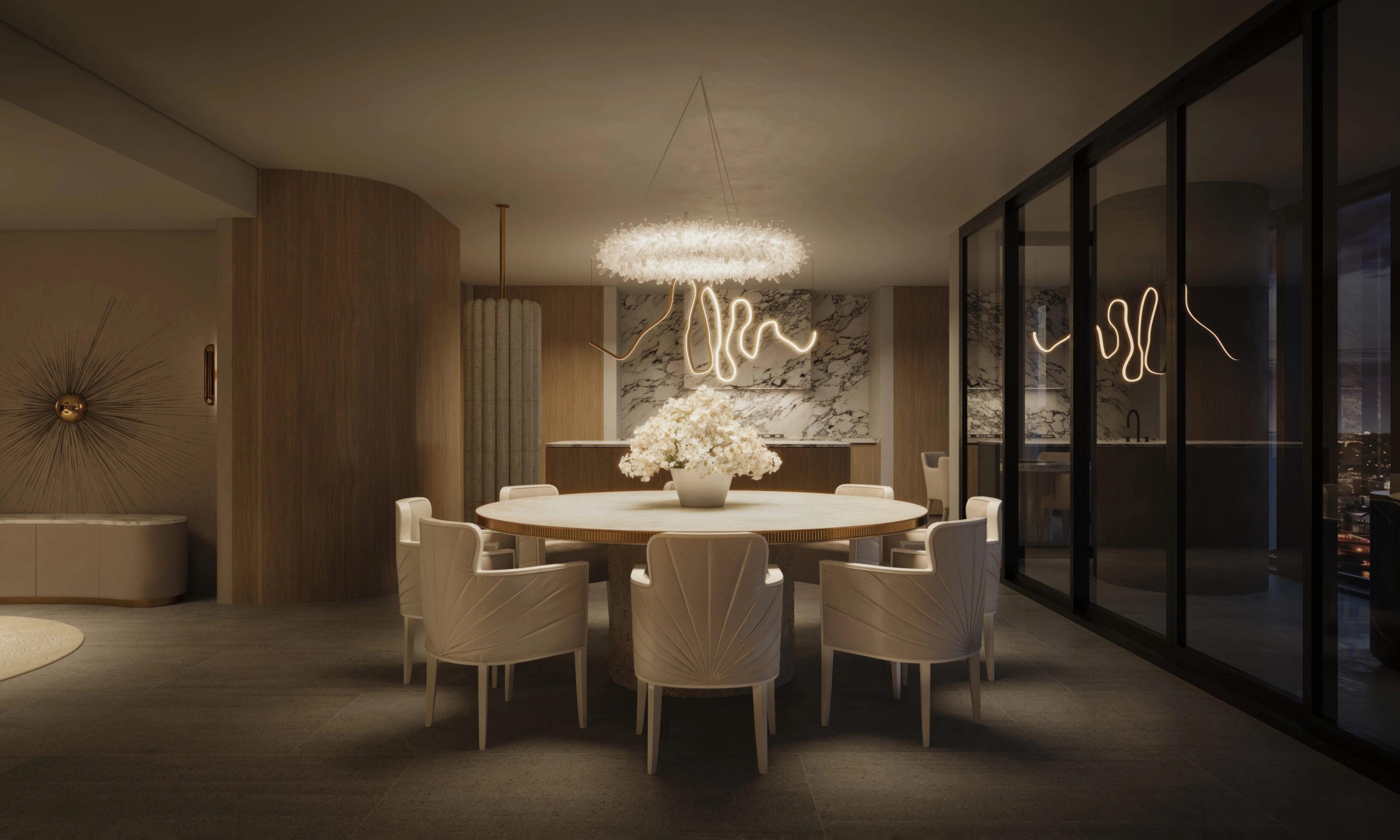 Warm circular dining room in Circular Quay with upholstered chairs and a floral centrepiece