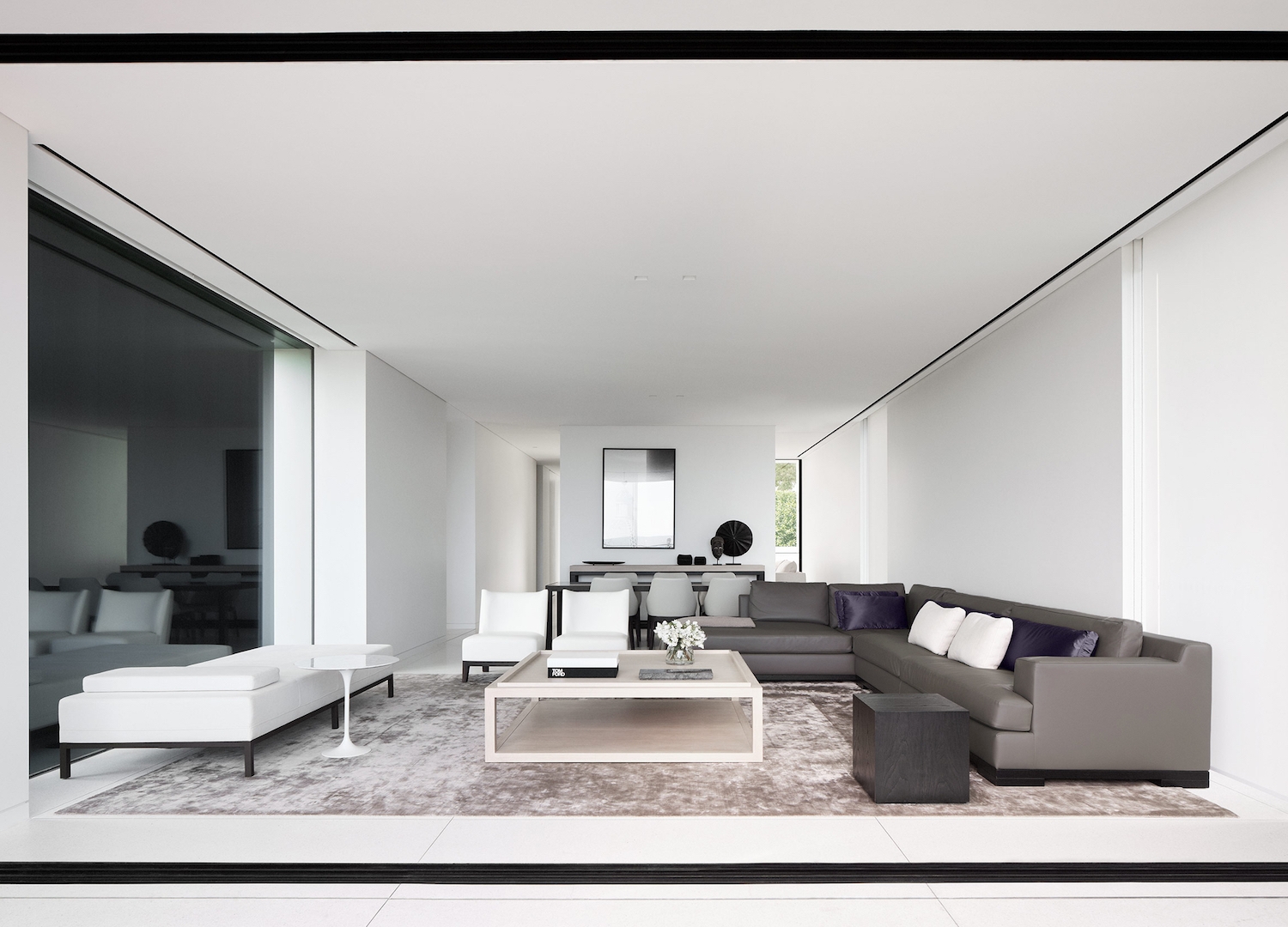Balmoral Beach living room with facing sectionals, a patterned rug and a full-height picture window