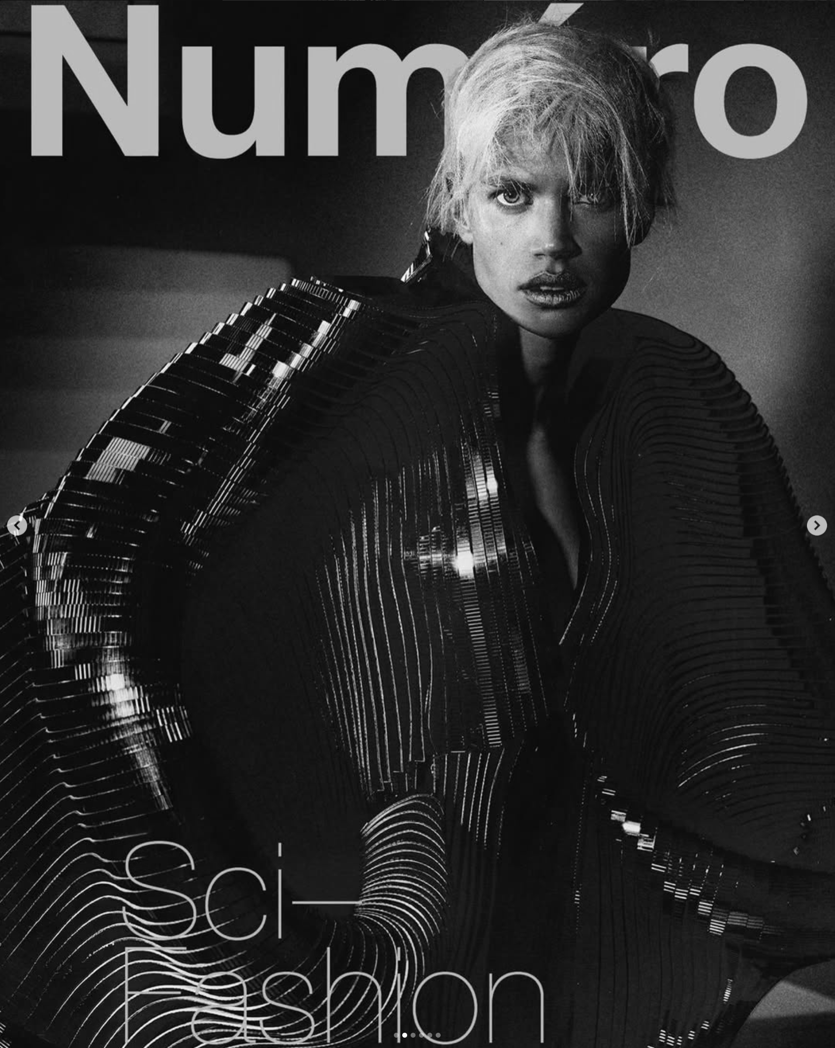 Numéro magazine cover showing a model in a shimmering black sculptural gown