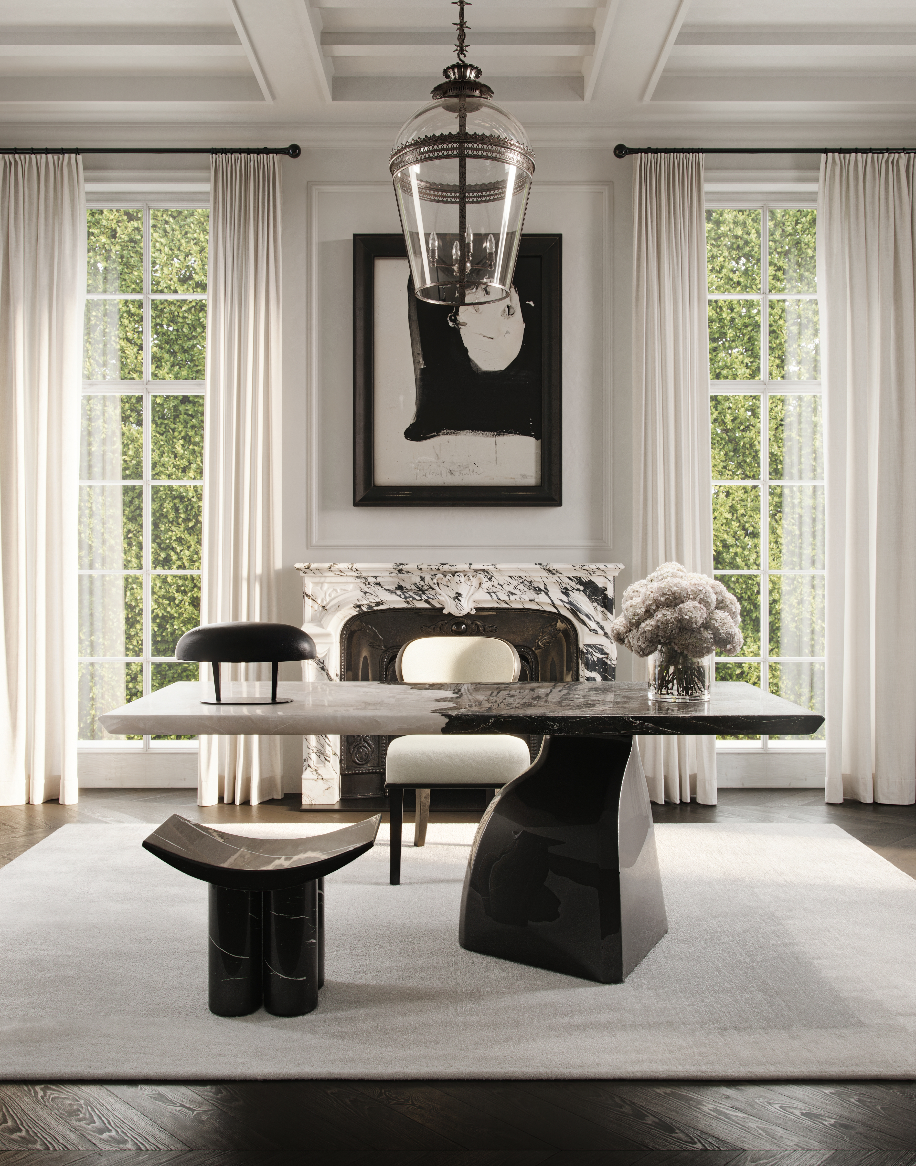 Sculptural stone dining table paired with blackened chairs beneath a lantern pendant, Palm Beach