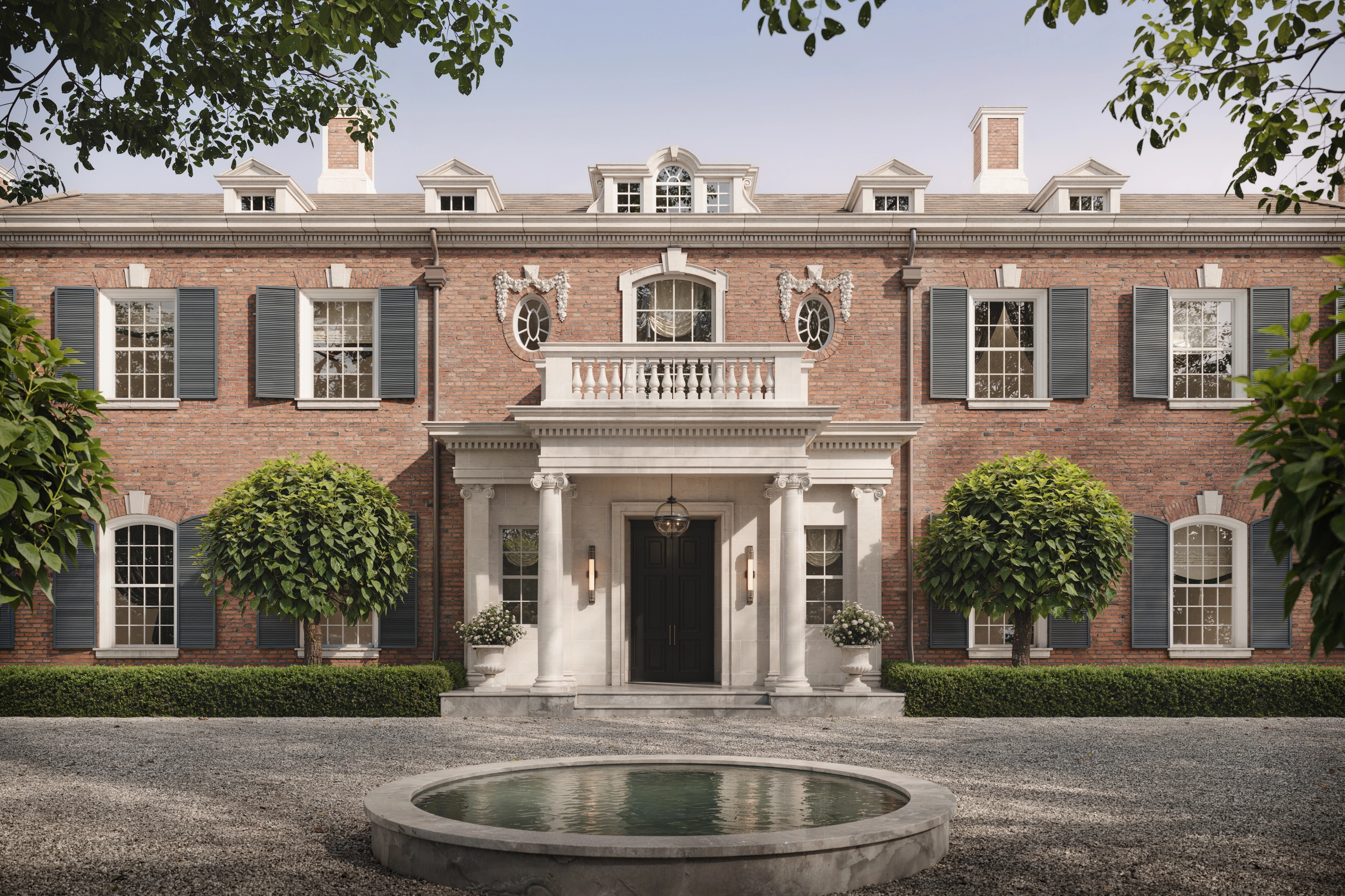 Grand red-brick Georgian mansion with a columned portico and circular fountain, Bel Air