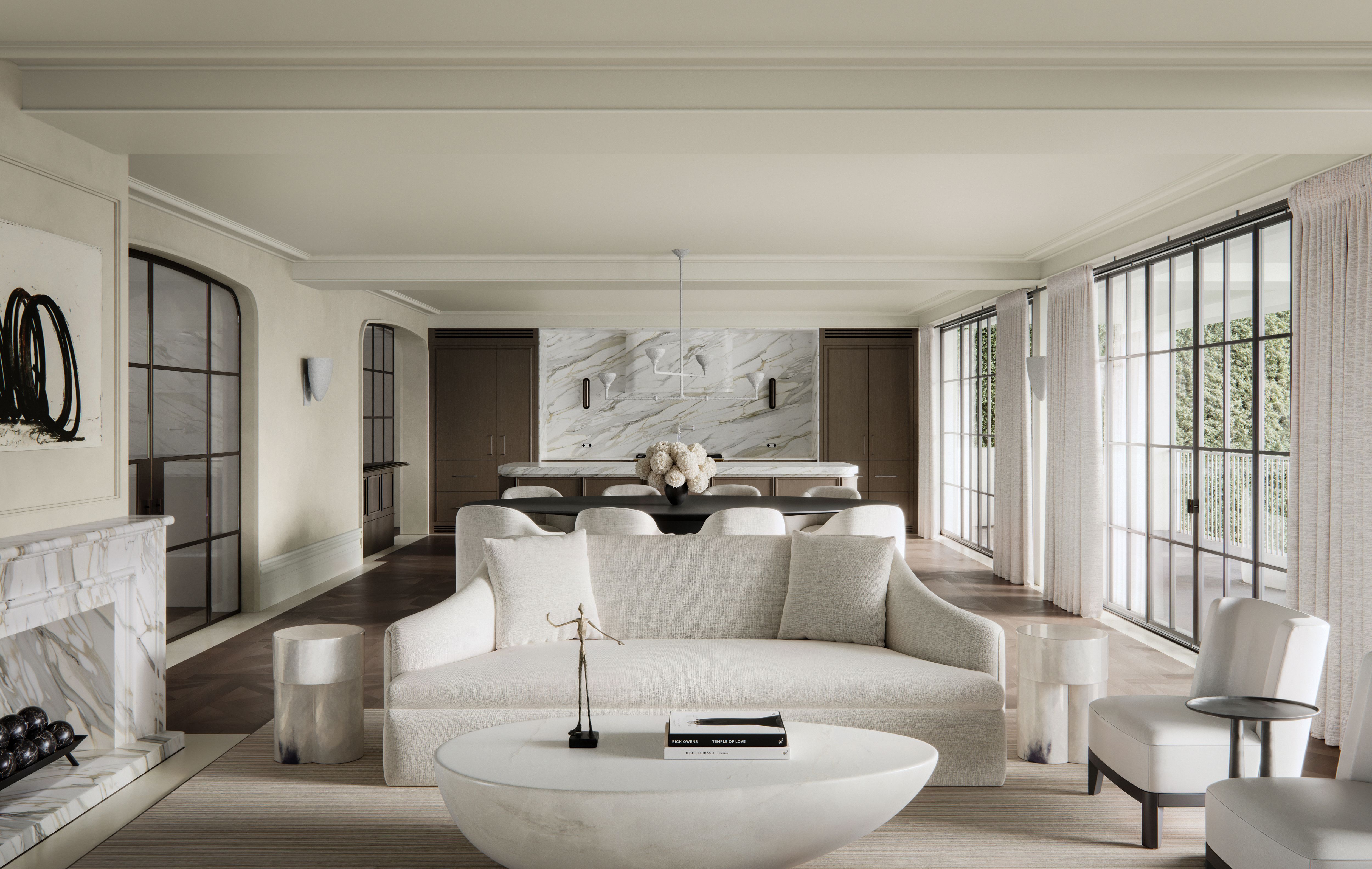 Light-filled sitting room with curved sofa and marble fireplace at Bellevue Hill