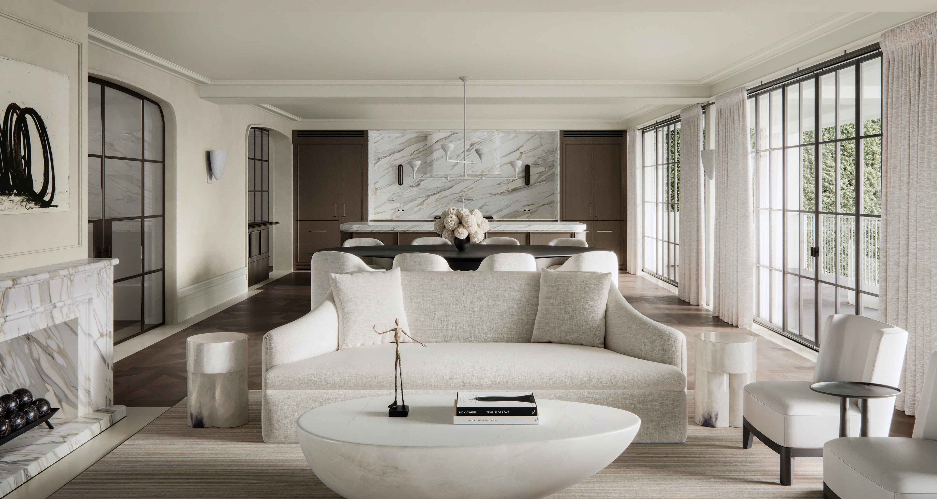 Light-filled sitting room with curved sofa and marble fireplace at Bellevue Hill