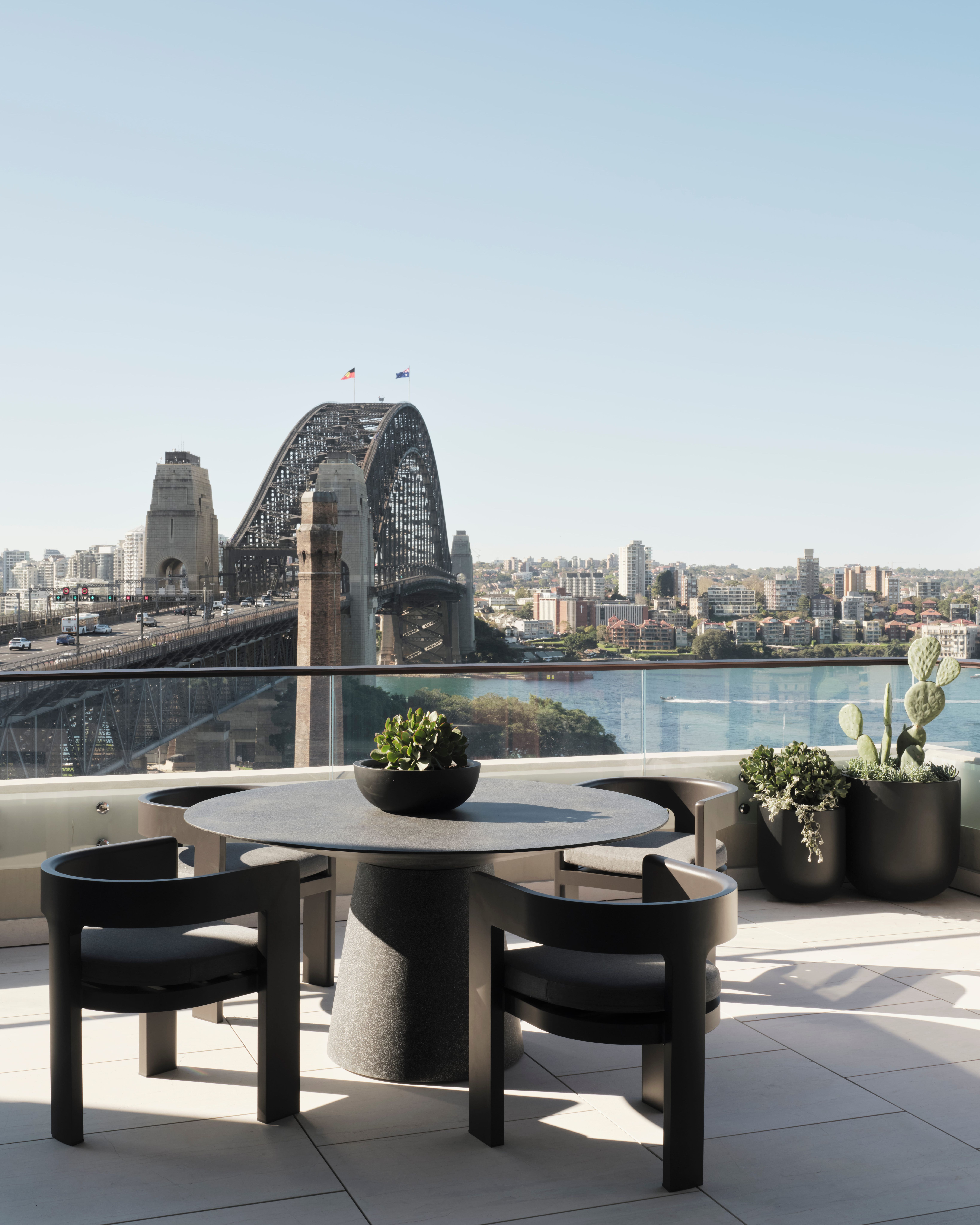 Terrace dining setting overlooking the Sydney Harbour Bridge from The Rocks