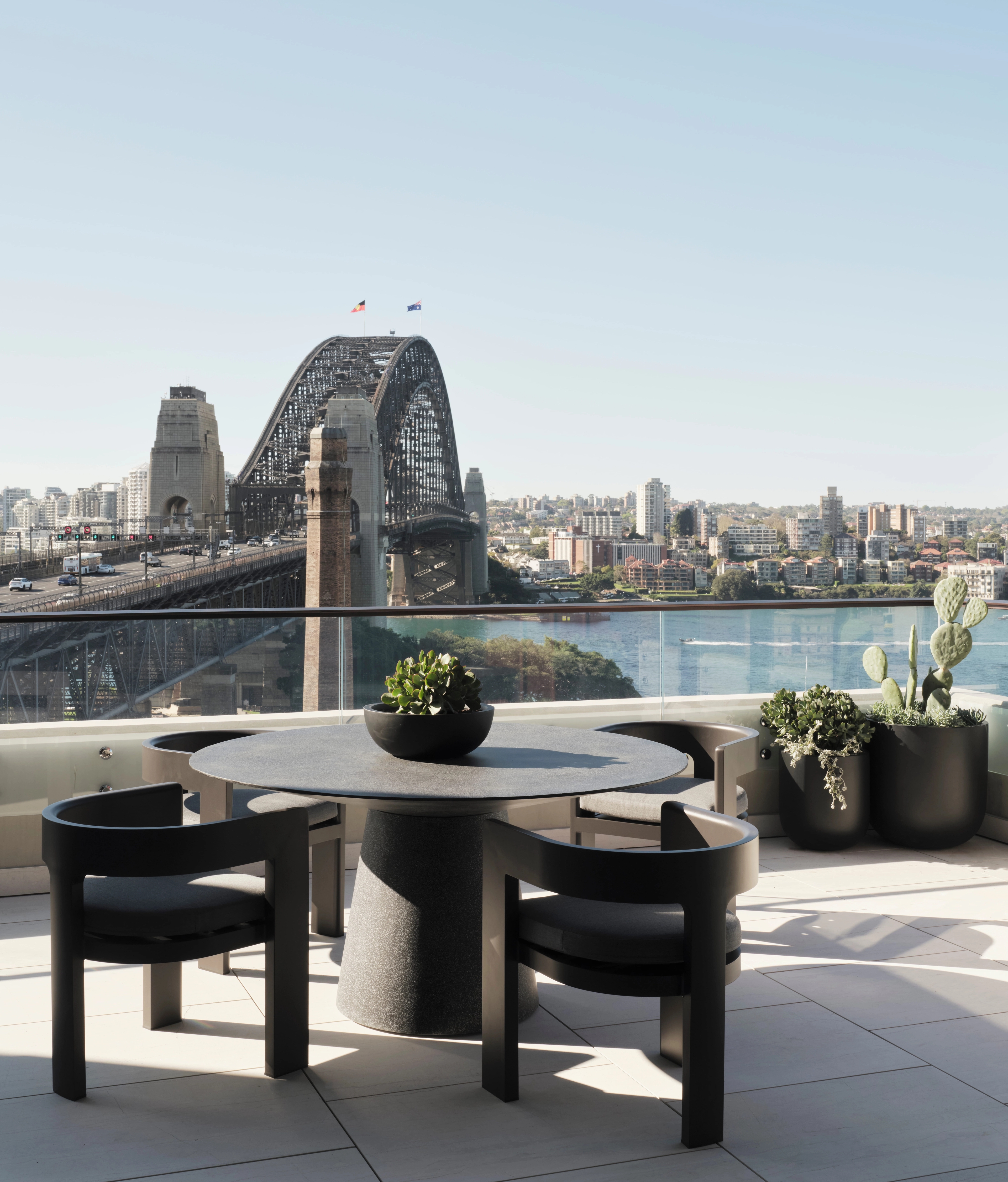 Terrace dining setting overlooking the Sydney Harbour Bridge from The Rocks