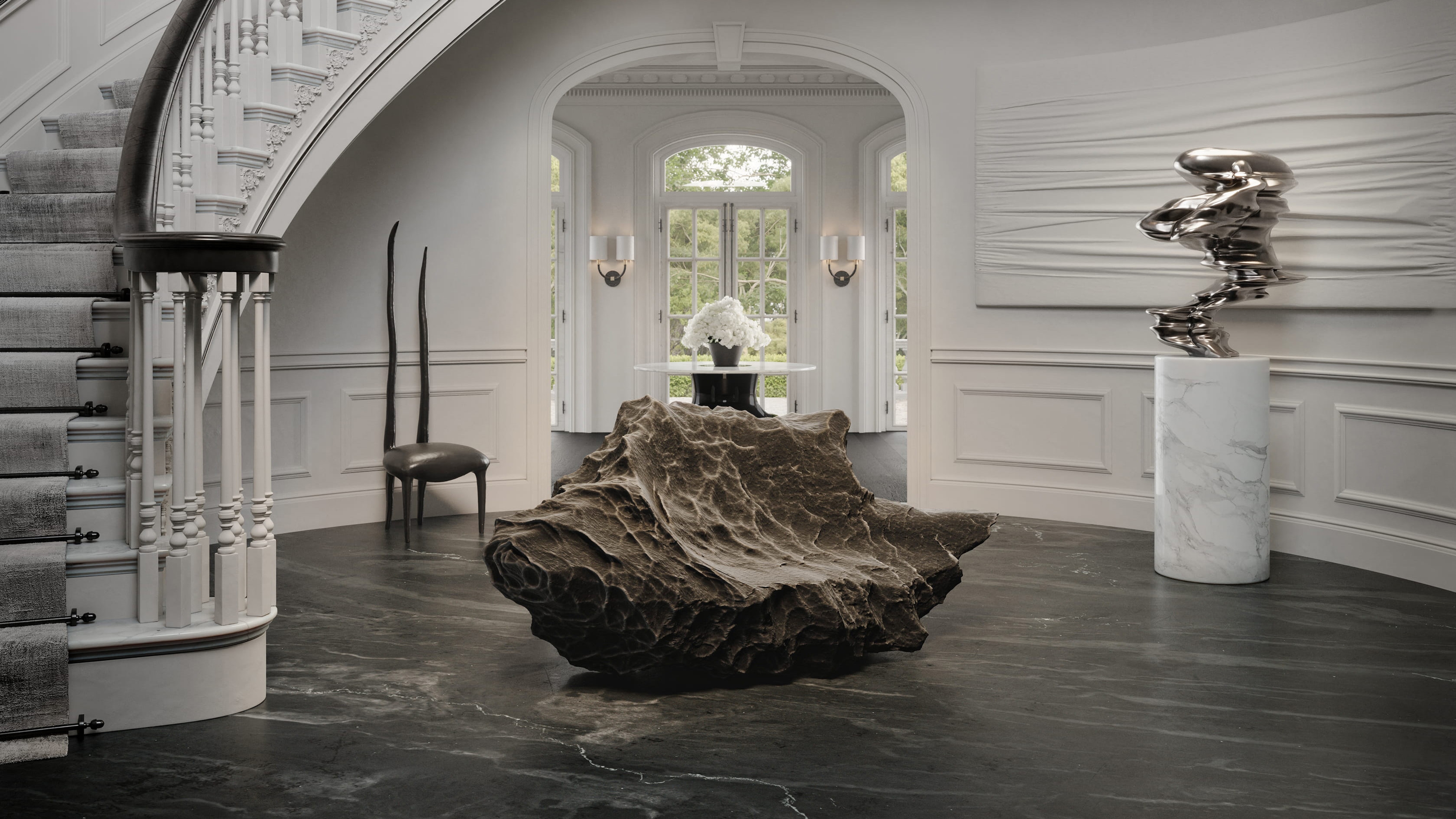 Gnarled driftwood sculpture centred beneath a curved staircase and arched window