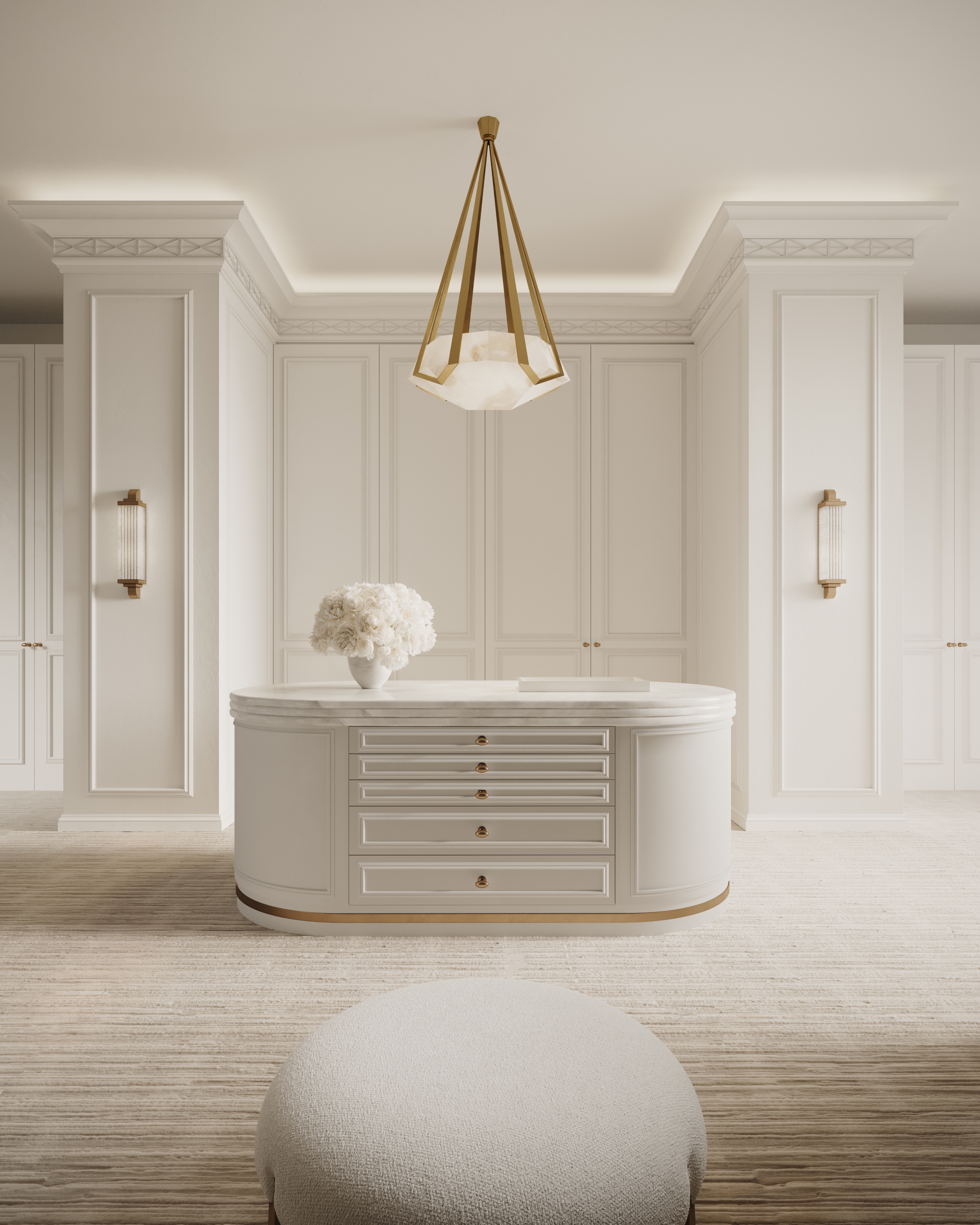 Jack Freeman-designed dressing room with a curved island, sculptural pendant and panelled joinery