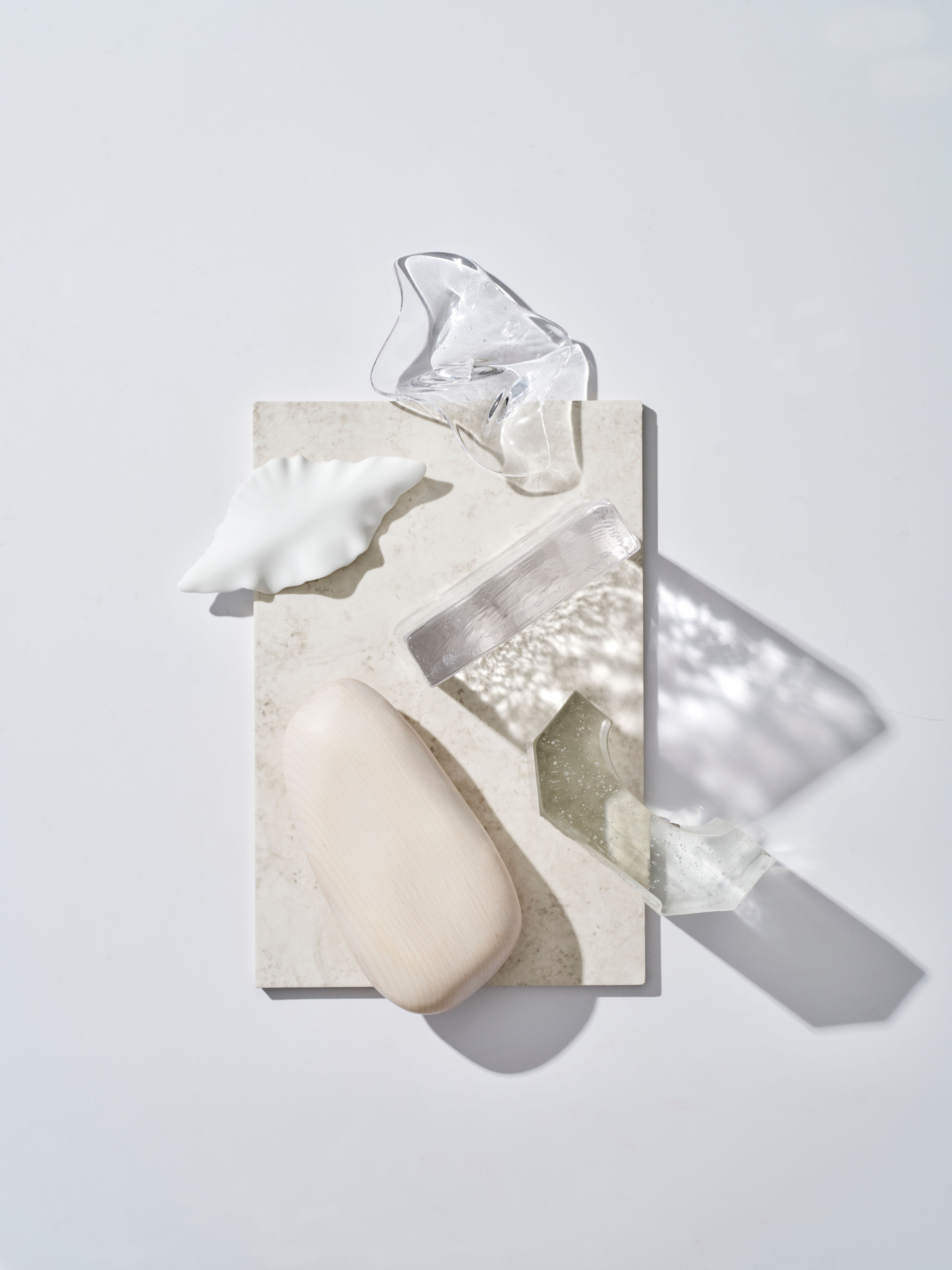 Pale stone, crystal and marble samples composing a Bellevue Hill material palette