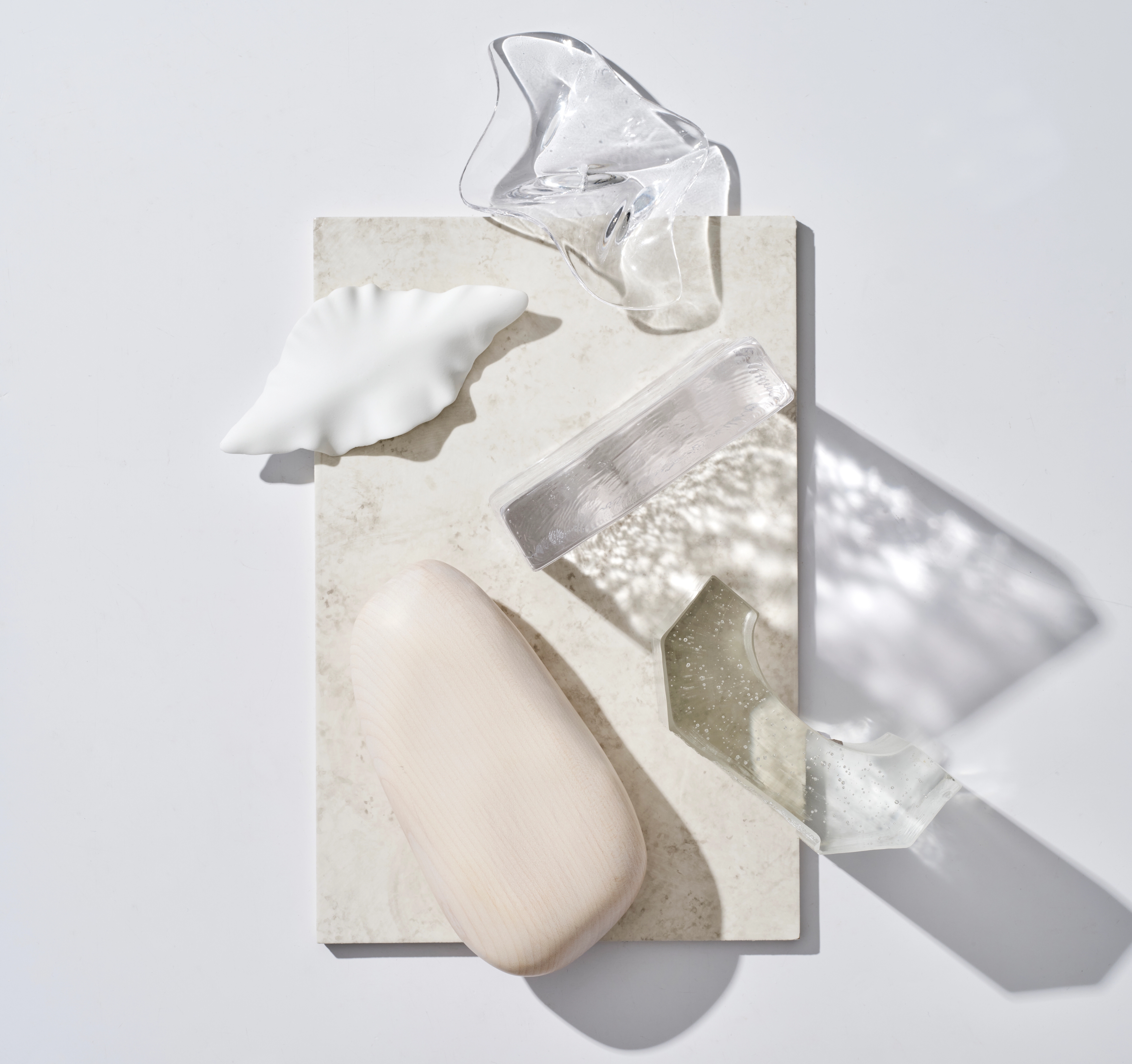 Pale stone, crystal and marble samples composing a Bellevue Hill material palette