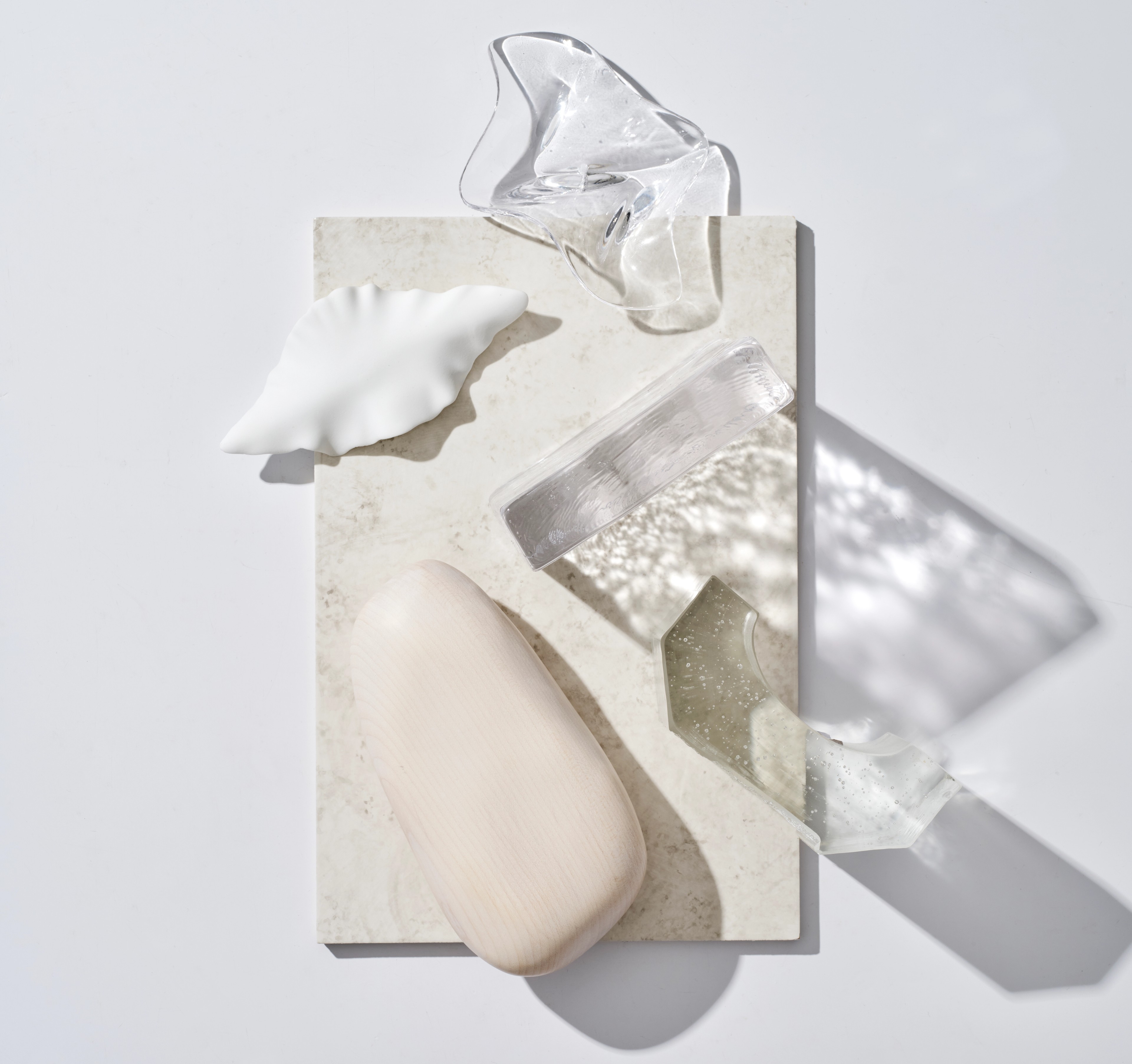 Pale stone, crystal and marble samples composing a Bellevue Hill material palette
