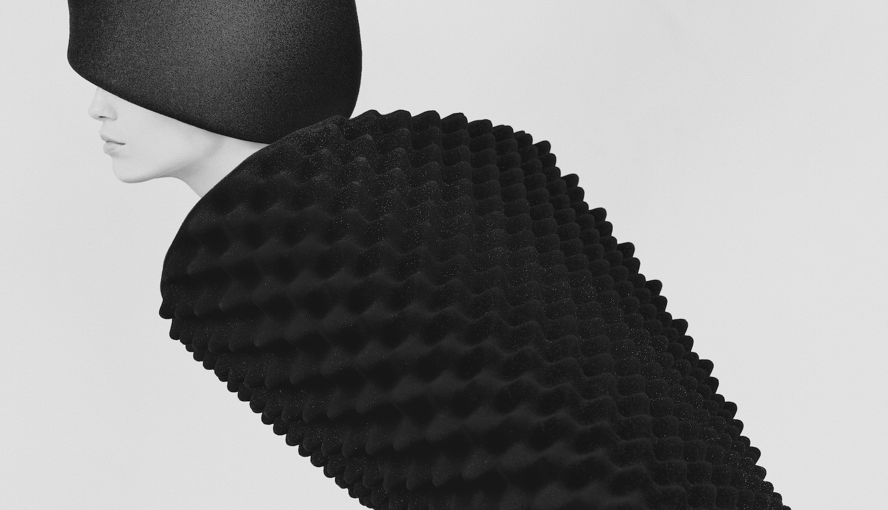 Surreal monochrome portrait of a figure in a dark helmet and textured cloak by Bastiaan Woudt